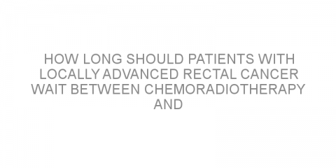 How long should patients with locally advanced rectal cancer wait between chemoradiotherapy and surgery to achieve the best outcome?